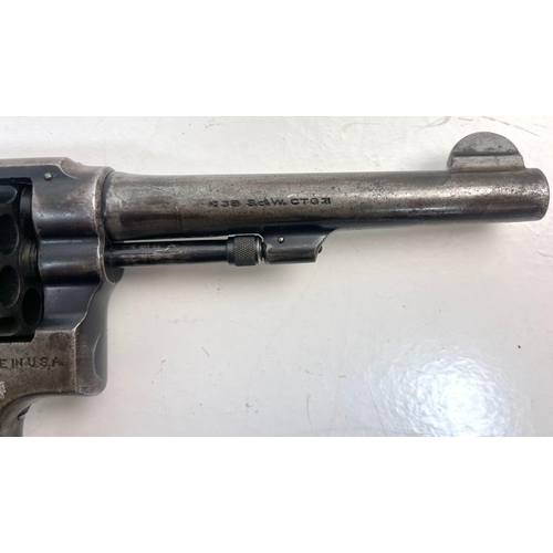 1264 - A Smith and Wesson 38 Revolver as used by the Texas Ranger with Original Bone Handle Grips. Comes wi... 