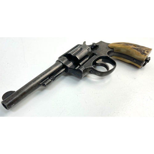 1264 - A Smith and Wesson 38 Revolver as used by the Texas Ranger with Original Bone Handle Grips. Comes wi... 