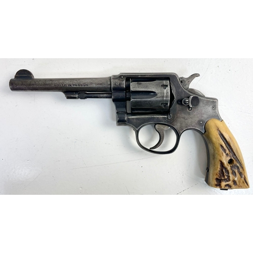 1264 - A Smith and Wesson 38 Revolver as used by the Texas Ranger with Original Bone Handle Grips. Comes wi... 