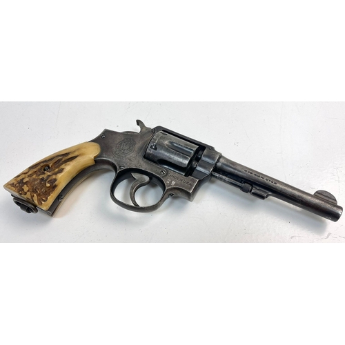 1264 - A Smith and Wesson 38 Revolver as used by the Texas Ranger with Original Bone Handle Grips. Comes wi... 