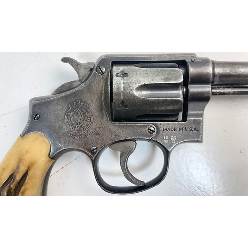 1264 - A Smith and Wesson 38 Revolver as used by the Texas Ranger with Original Bone Handle Grips. Comes wi... 