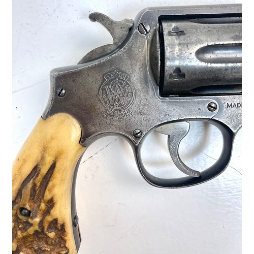 1264 - A Smith and Wesson 38 Revolver as used by the Texas Ranger with Original Bone Handle Grips. Comes wi... 