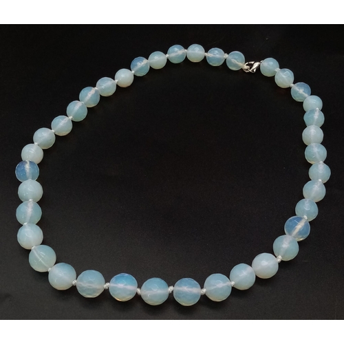 1394 - A Moonstone Bead Necklace. 10mm beads. 42cm length