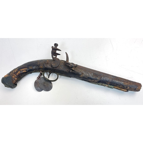 15 - A Battle of Waterloo Pistol. A British military flintlock pistol found on the battlefield at Waterlo... 