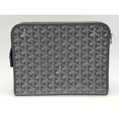 1354 - A Goyard Jouvence Grey Washbag. Grey and white geometric pattern on canvas. Water resistant inner co... 