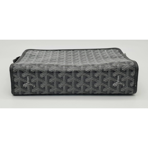 1354 - A Goyard Jouvence Grey Washbag. Grey and white geometric pattern on canvas. Water resistant inner co... 