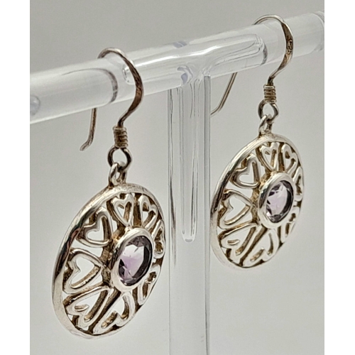 1085 - A Pair of Silver Purple Stone Earrings.