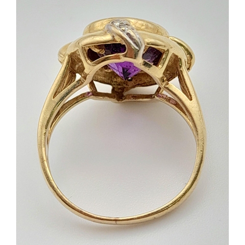 1286 - A 4ct (approx) Amethyst 14K Gold and Diamond Ring. Size K.
5g total weight