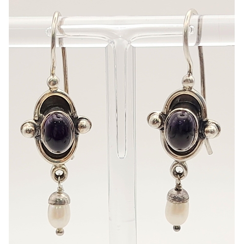 1380 - A Pair of Silver Purple Stone earrings.