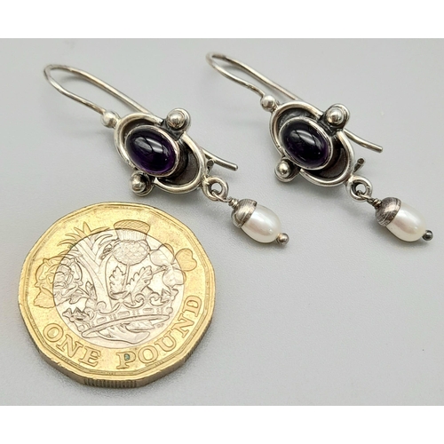 1380 - A Pair of Silver Purple Stone earrings.