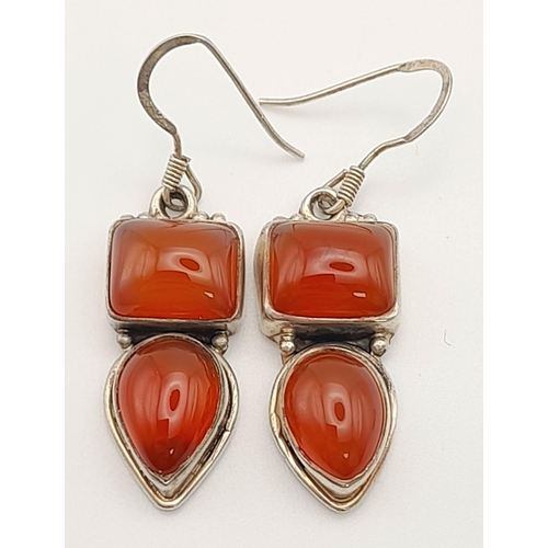 1408 - A Pair of Red Agate Silver Drop Earrings.