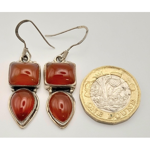 1408 - A Pair of Red Agate Silver Drop Earrings.