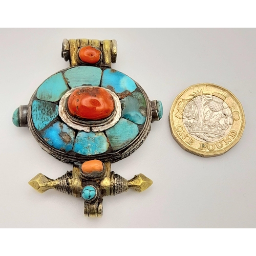 1486 - A Natural Coral and Turquoise Ethnic Pendant. 6cm