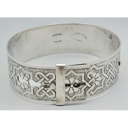 1501 - A Vintage Silver Bangle. Belt buckle (adjustable) shape with alternating pattern decoration. 27.5g