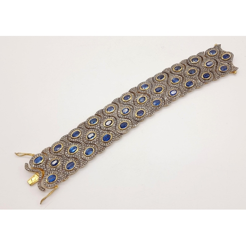 223 - 9K Yellow and White Gold Bracelet with 33ct Sapphire and 4ct rose cut Diamonds. Comes with WGI Certi... 