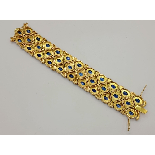 223 - 9K Yellow and White Gold Bracelet with 33ct Sapphire and 4ct rose cut Diamonds. Comes with WGI Certi... 