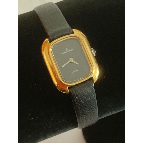 902 - Ladies Vintage MICHEL HERBELIN  Gold Plated evening wristwatch , having square black face with golde... 