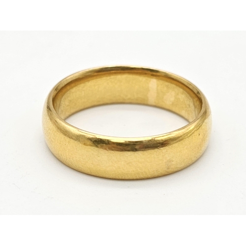 539 - A yellow gold mixed lot consisting of:
22 K eight bangles, one open bangle, one chain, one ring and ... 