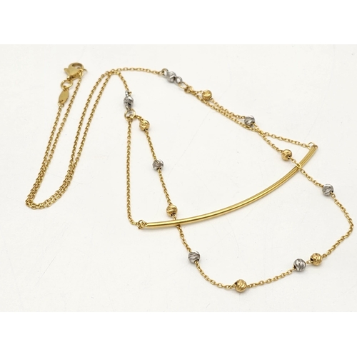 595 - A mixed lot consisting of:
22 K yellow gold Two pairs of earrings, a chain with pendant and a chain ... 