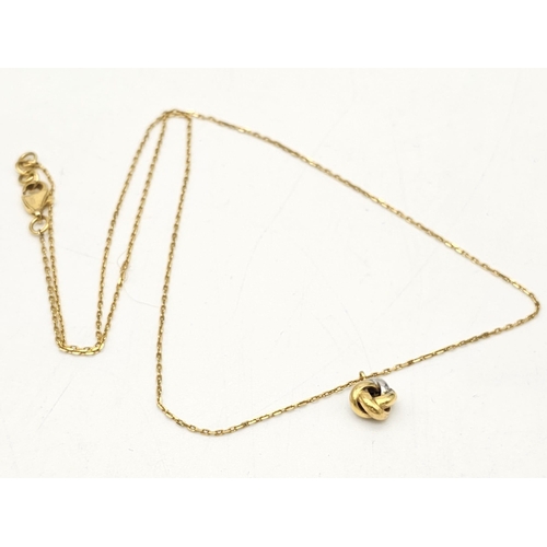 595 - A mixed lot consisting of:
22 K yellow gold Two pairs of earrings, a chain with pendant and a chain ... 