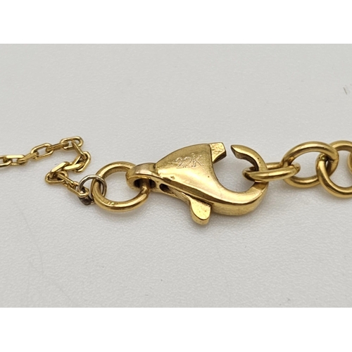 595 - A mixed lot consisting of:
22 K yellow gold Two pairs of earrings, a chain with pendant and a chain ... 