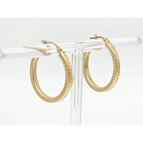 595 - A mixed lot consisting of:
22 K yellow gold Two pairs of earrings, a chain with pendant and a chain ... 