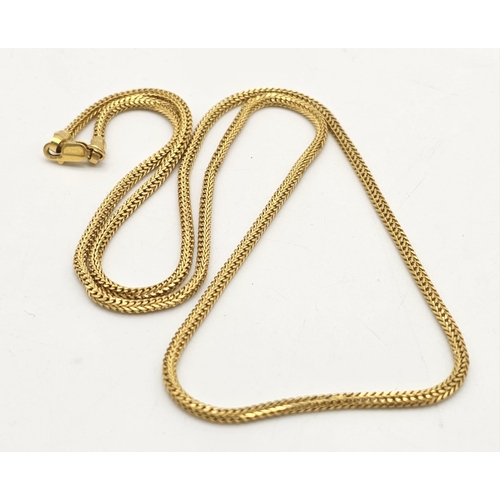 630 - A yellow gold mixed lot consisting of :
22 K chain, earrings and bangle
18 K chain with pendant and ... 