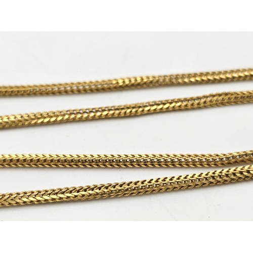 630 - A yellow gold mixed lot consisting of :
22 K chain, earrings and bangle
18 K chain with pendant and ... 