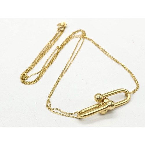 691 - A mixed lot consisting of:
18 k yellow gold Two necklaces, one chain necklace with pendant and two p... 