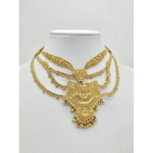 712 - Withdrawn
A yellow gold mixed lot consisting of: 
22 K Necklace and pair of earrings (butterfly miss... 