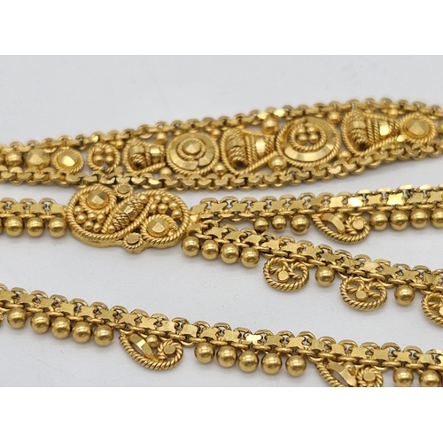 712 - Withdrawn
A yellow gold mixed lot consisting of: 
22 K Necklace and pair of earrings (butterfly miss... 