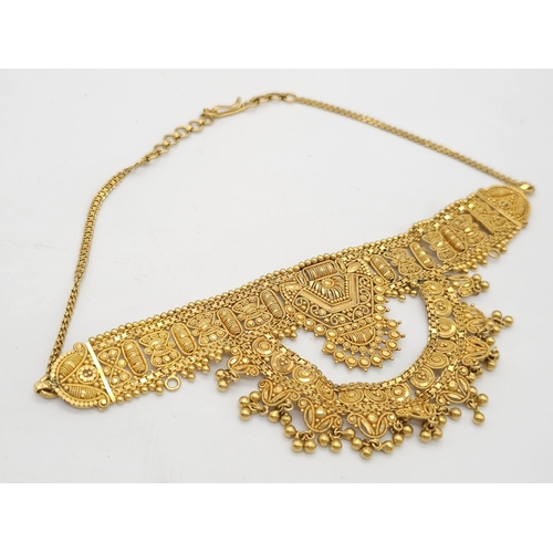 712 - Withdrawn
A yellow gold mixed lot consisting of: 
22 K Necklace and pair of earrings (butterfly miss... 