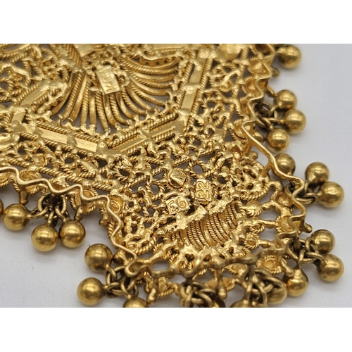 712 - Withdrawn
A yellow gold mixed lot consisting of: 
22 K Necklace and pair of earrings (butterfly miss... 