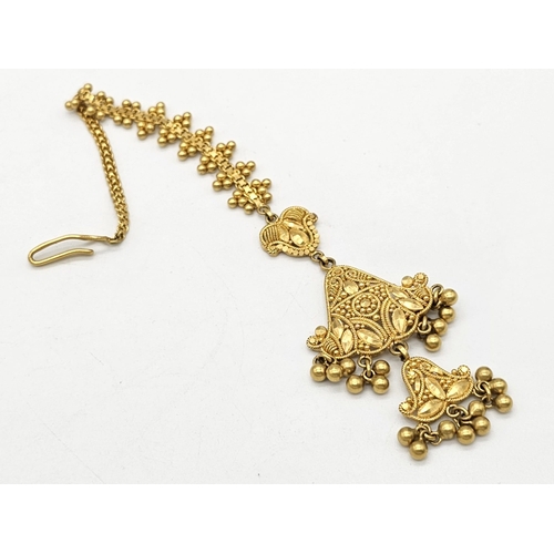 712 - Withdrawn
A yellow gold mixed lot consisting of: 
22 K Necklace and pair of earrings (butterfly miss... 