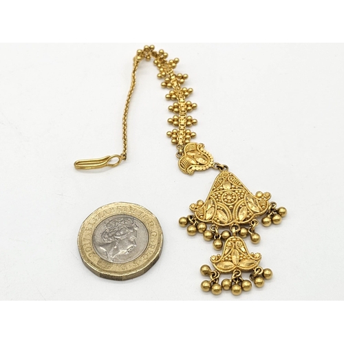 712 - Withdrawn
A yellow gold mixed lot consisting of: 
22 K Necklace and pair of earrings (butterfly miss... 