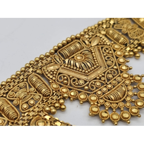 712 - Withdrawn
A yellow gold mixed lot consisting of: 
22 K Necklace and pair of earrings (butterfly miss... 