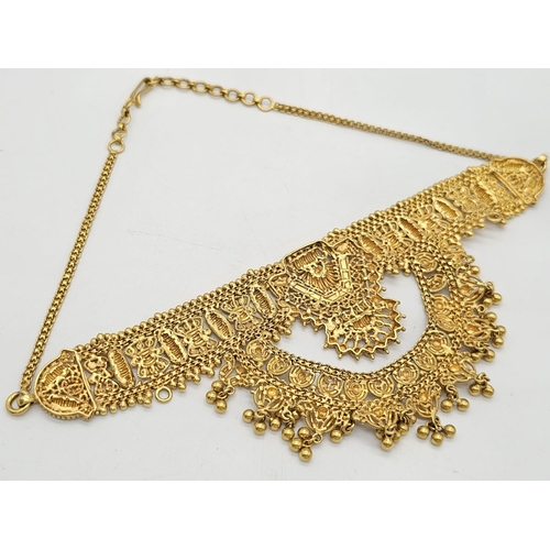 712 - Withdrawn
A yellow gold mixed lot consisting of: 
22 K Necklace and pair of earrings (butterfly miss... 