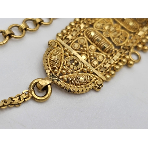 712 - Withdrawn
A yellow gold mixed lot consisting of: 
22 K Necklace and pair of earrings (butterfly miss... 