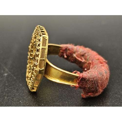 726 - Withdrawn
A yellow gold mixed lot consisting of 
22 K ring (with thread as size reducer)
21 K bracel... 