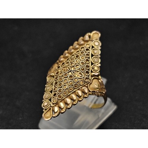 726 - Withdrawn
A yellow gold mixed lot consisting of 
22 K ring (with thread as size reducer)
21 K bracel... 