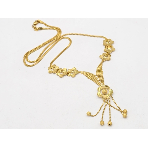 790 - A yellow gold mixed lot consisting of: 
21 K bracelet, necklace, chain and bangle A/F
20 K necklace ... 