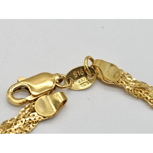 790 - A yellow gold mixed lot consisting of: 
21 K bracelet, necklace, chain and bangle A/F
20 K necklace ... 