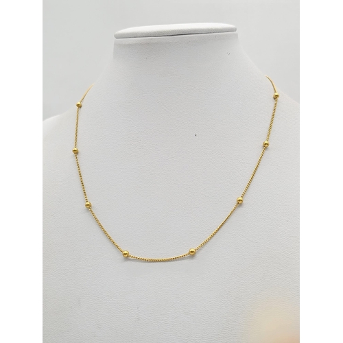 790 - A yellow gold mixed lot consisting of: 
21 K bracelet, necklace, chain and bangle A/F
20 K necklace ... 