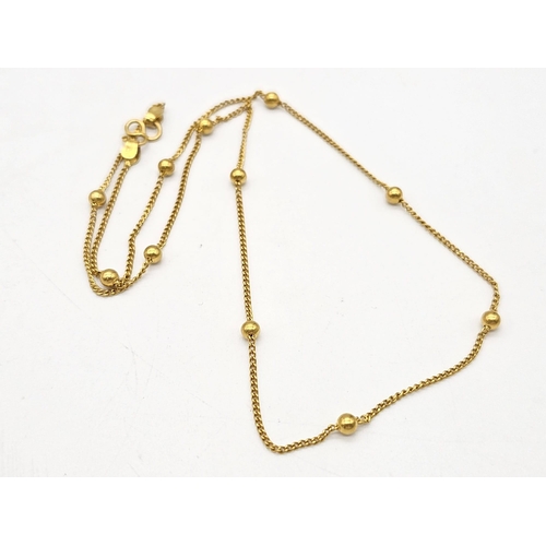 790 - A yellow gold mixed lot consisting of: 
21 K bracelet, necklace, chain and bangle A/F
20 K necklace ... 