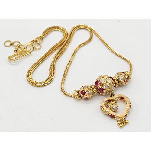 790 - A yellow gold mixed lot consisting of: 
21 K bracelet, necklace, chain and bangle A/F
20 K necklace ... 