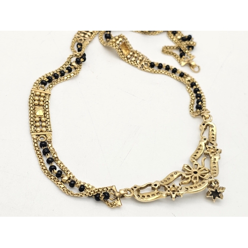 797 - A yellow gold mixed lot consisting of: 
24 K gold bar (weight: 2.5 g)
22 K Chain with pendant
18 K  ... 