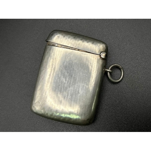 1124 - An Antique Sterling Silver Vesta Case. Hallmarks for Birmingham 1904. 5.5 x 4cm. 31.5g