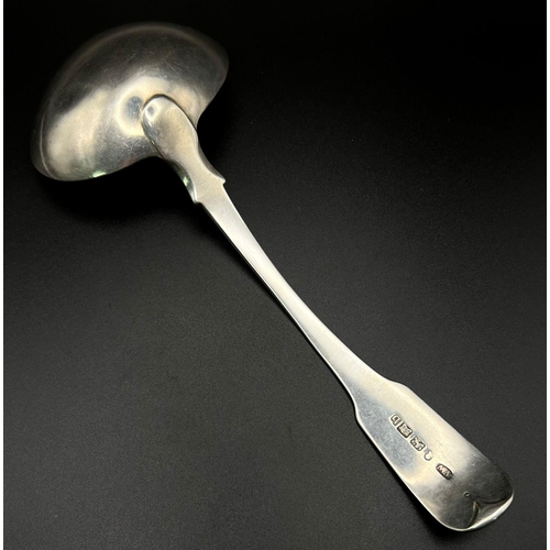 1389 - A GEORGIAN SILVER LADLE HALLMARKED FOR EDINBURGH .59.6gms