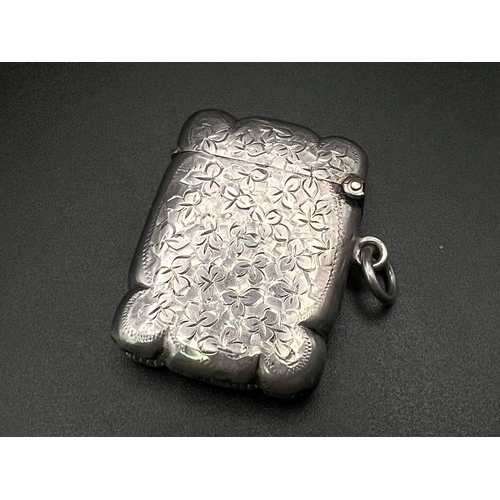 1472 - An Antique Sterling Silver Vesta Case. Hallmarks for Birmingham 1899. 23g. 4.5cm x 4cm.