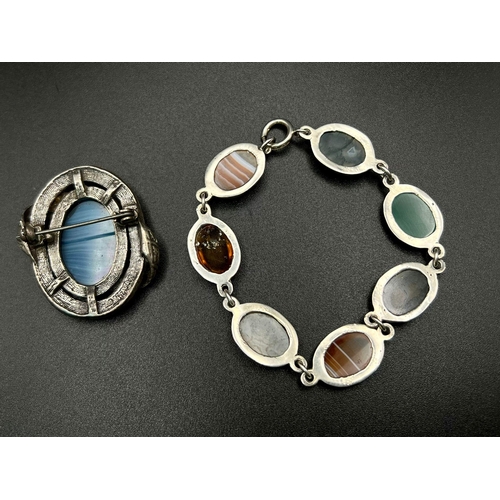 695 - A Parcel of Two Scottish Celtic Pieces Comprising; 1) A Hardstone Bracelet Set with Agate, Amber and... 